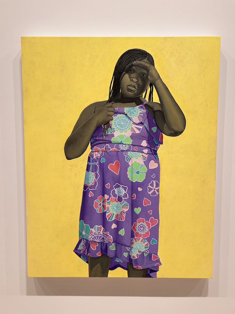 painting by Amy Sherald of a young girl in a patterned purple dress shielding her eyes; the space behind her is bright yellow