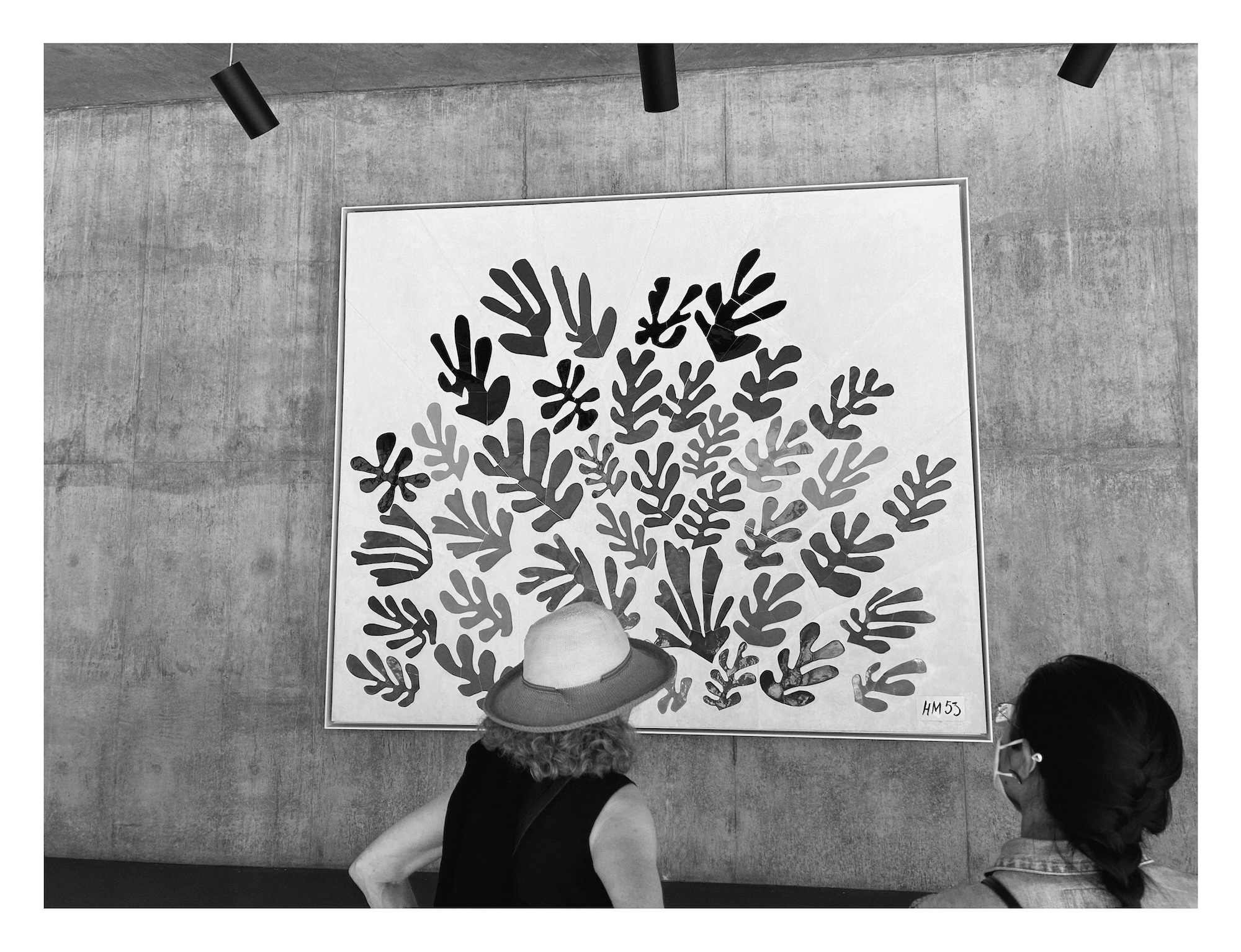 a pair of women looking at Henri Matisse's work La Gerbe at LACMA