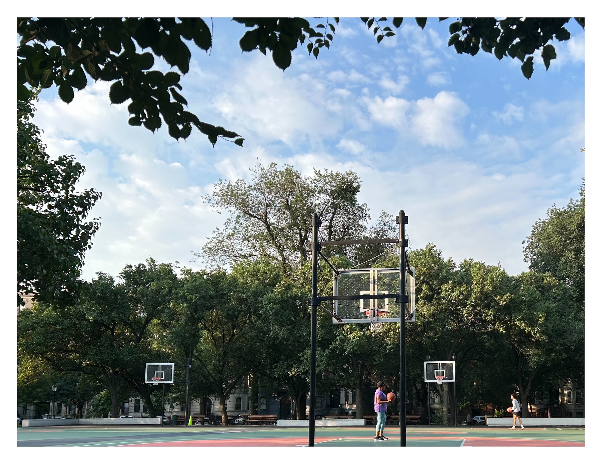 shooting hoops in Brower Park